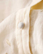 Women's Button-Front Blouse with Floral Embroidery and Layered Sheer Hem