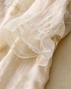 Women's Button-Front Blouse with Floral Embroidery and Layered Sheer Hem