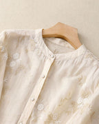 Women's Button-Front Blouse with Floral Embroidery and Layered Sheer Hem