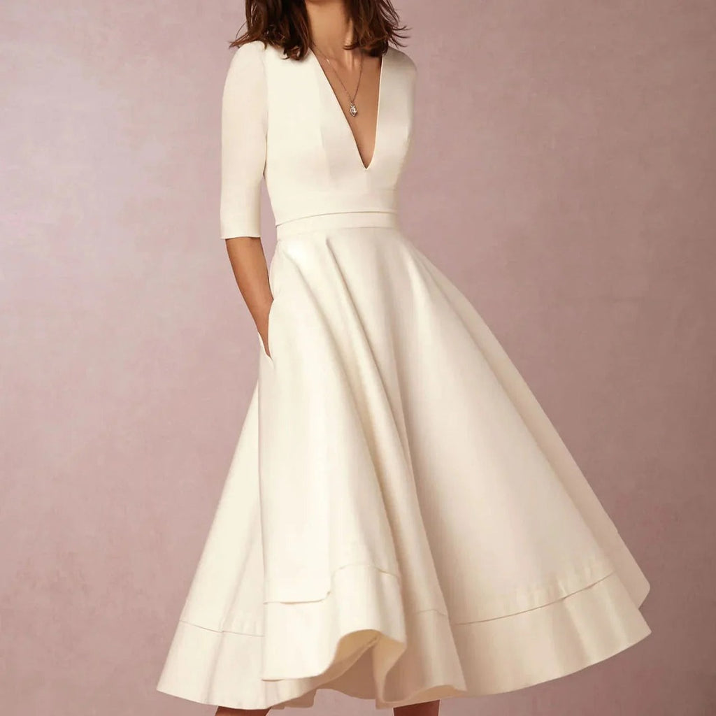 Women's Deep V-Neckline Midi Dress with Full A-Line Skirt and Three-Quarter Sleeves