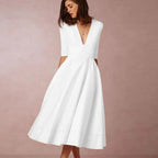 Women's Deep V-Neckline Midi Dress with Full A-Line Skirt and Three-Quarter Sleeves