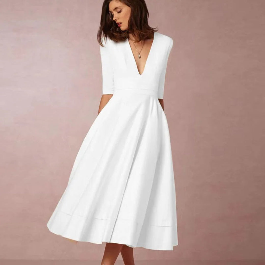 Women's Deep V-Neckline Midi Dress with Full A-Line Skirt and Three-Quarter Sleeves