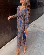 Women's Long Sleeve Midi Dress with Deep V-Neckline and Twisted Knot Waist Detail in Amber Botanical Print