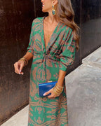 Women's Long Sleeve Midi Dress with Deep V-Neckline and Twisted Knot Waist Detail in Amber Botanical Print