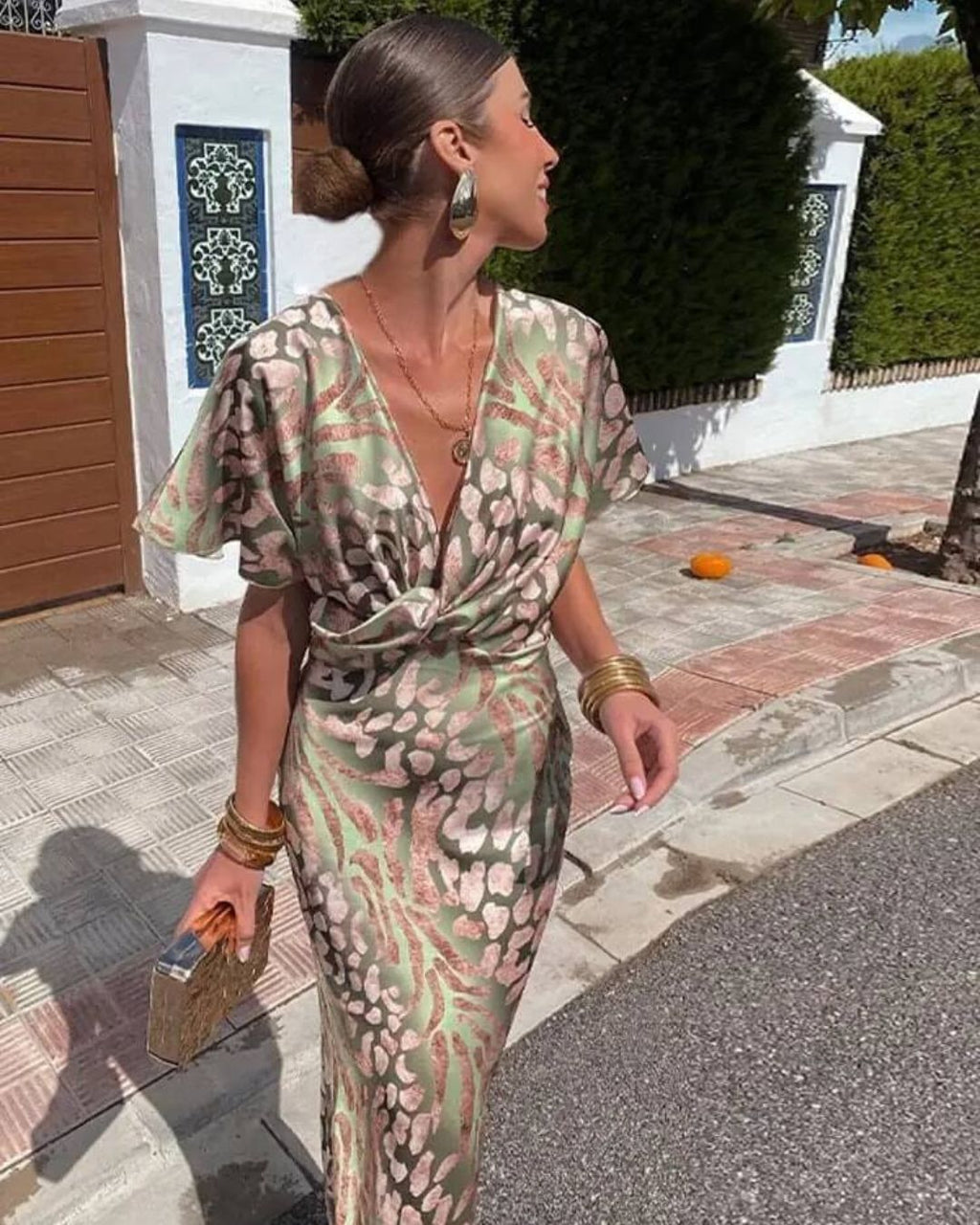 Women's Maxi Dress with Deep V-Neckline and Twisted Front Knot Waist Detail and Abstract Print