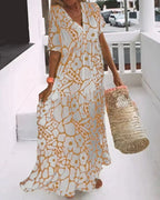 Women's Maxi Dress with Large-Scale Floral Print V-Neckline and Short Flutter Sleeves