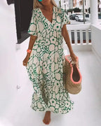 Women's Maxi Dress with Large-Scale Floral Print V-Neckline and Short Flutter Sleeves