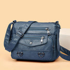 Women's Multi-Pocket Shoulder Bag with Heart Hardware and Front Zip Pockets