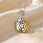 Women's Necklace with Abstract Figure and Cat Pendant on Cable Chain in Two-Tone Finish