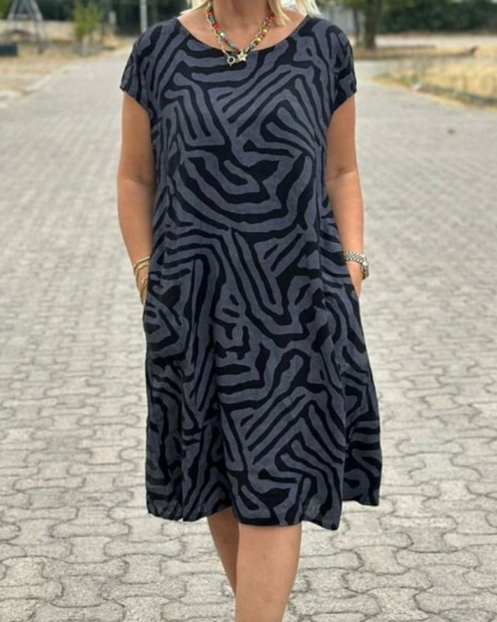 Women's Short Sleeve Dress with Abstract Swirl Print Round Neckline and Side Pockets