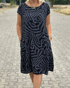 Women's Short Sleeve Dress with Abstract Swirl Print Round Neckline and Side Pockets