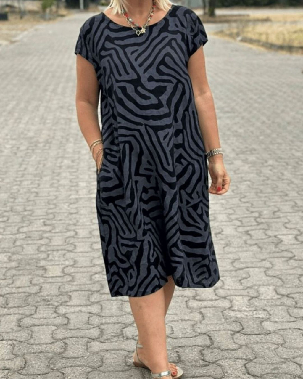 Women's Short Sleeve Dress with Abstract Swirl Print Round Neckline and Side Pockets