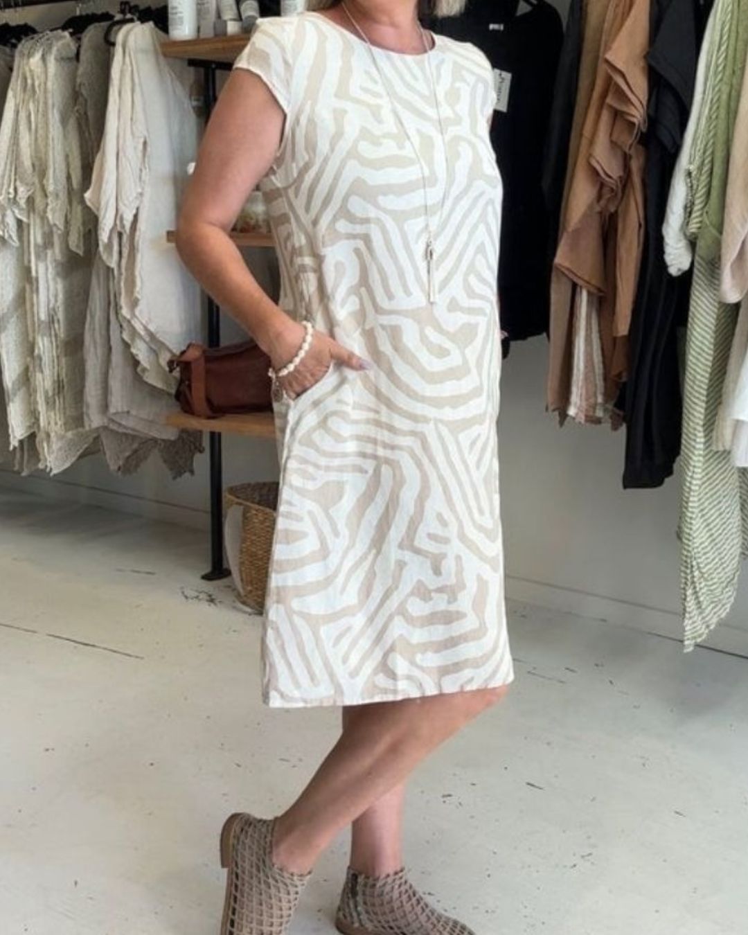 Women's Short Sleeve Dress with Abstract Swirl Print Round Neckline and Side Pockets