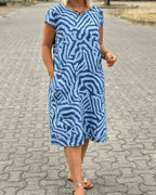 Women's Short Sleeve Dress with Abstract Swirl Print Round Neckline and Side Pockets