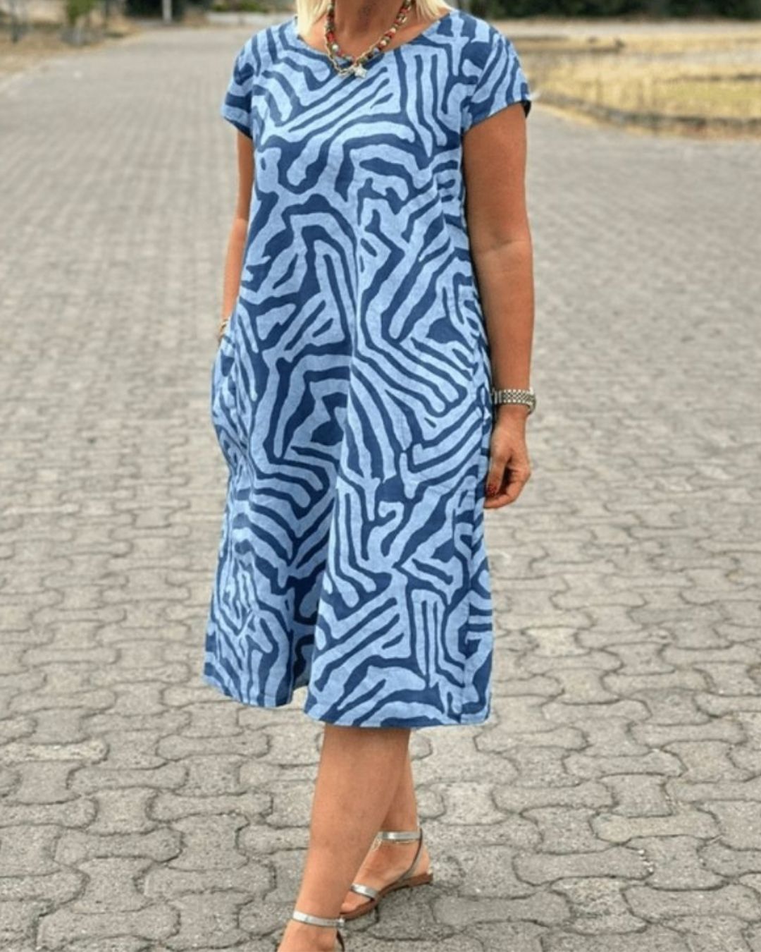 Women's Short Sleeve Dress with Abstract Swirl Print Round Neckline and Side Pockets