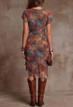 Women's Short Sleeve Dress with Deep V-Neckline and All-Over Abstract Print and Front Slit