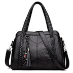 Women's Structured Handbag with Braided-Trim Handles Chevron Panel Front and Tassel Charm Detail