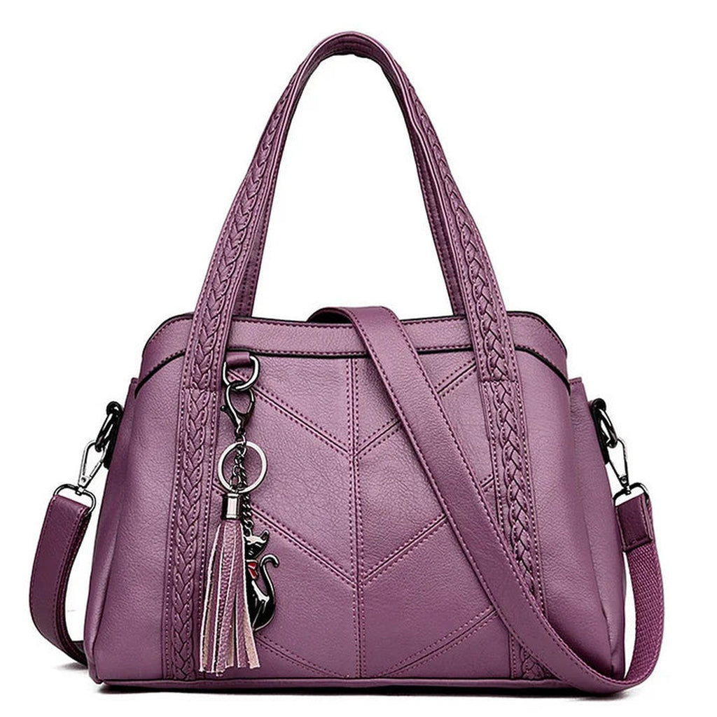 Women's Structured Handbag with Braided-Trim Handles Chevron Panel Front and Tassel Charm Detail