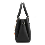 Women's Structured Handbag with Embossed Panel and Tassel Charm