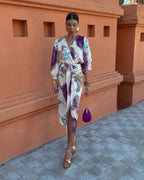 Women's Wrap Dress with Deep V-Neckline and Tie Waist Belt in Abstract Print