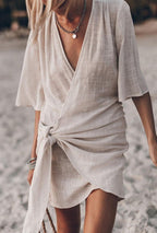 Women's Wrap Mini Dress with Deep V-Neckline and Front Tie Knot Detail and Short Sleeves