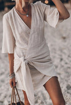 Women's Wrap Mini Dress with Deep V-Neckline and Front Tie Knot Detail and Short Sleeves