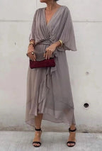Women's Wrap-Style Midi Dress with Deep V-Neckline and Tie Waist Belt and Wide Batwing Sleeves and Layered Sheer Skirt